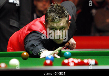 Mark Allen in action against Ronnie O'Sullivan during the Ladbrokes Mobile Masters at Wembley Arena, London. Stock Photo