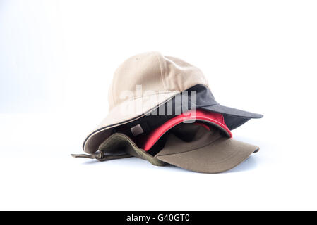 Stacks of cap on white background Stock Photo