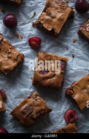 Cherries and chocolate blondies Stock Photo