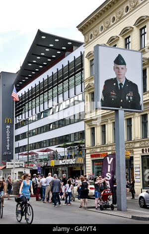 Checkpoint Charlie ( Checkpoint C )Friedrichstrasse   was the best-known Berlin Wall crossing point between East Berlin and West Berlin during the Cold War. Germany Stock Photo