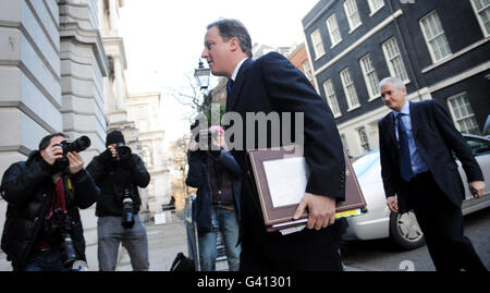 Prime Minister David Cameron leaves 10 Downing Street in London today for Prime Minister's Questions at the House of Commons. Stock Photo