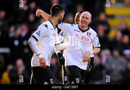 Fulham's Clint Dempsey (right) celebrates after scoring the opening goal of  the game with his team-mate Eddie Johnson (left Stock Photo - Alamy