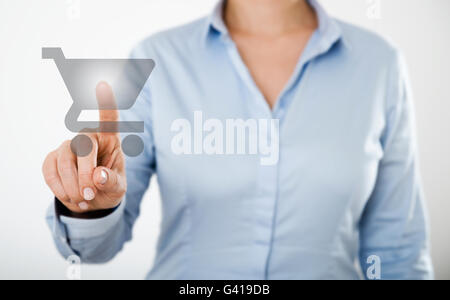 businesswoman pressing web internet icons on the digital touch screen of a tablet pc or a smart mobile phone Stock Photo