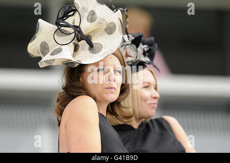 Horse Racing - The Investec Derby Festival - Ladies Day - Epsom Racecourse. Female racegoers during The Investec Ladies Day Stock Photo