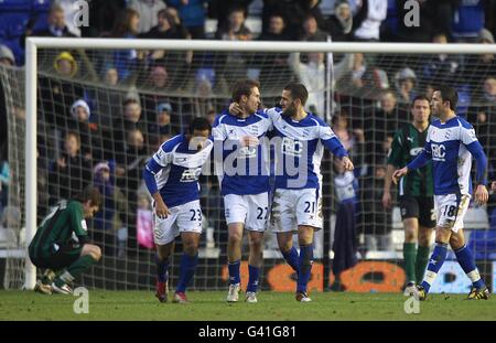 Soccer - FA Cup - Fourth Round - Birmingham City v Coventry City - St Andrew's. Birmingham City's Stuart Parnaby (2nd right) celebrates after scoring their second goal with his team-mates Stock Photo