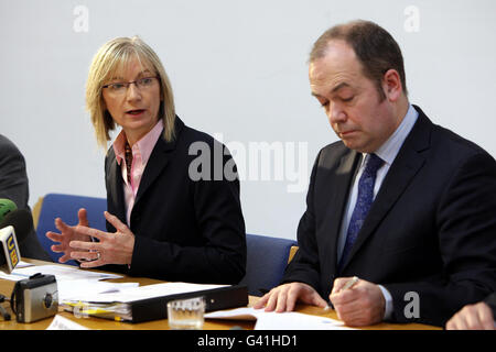 Director of the Public Health Agency Carolyn Harper with Chief Medical officer Dr Michael McBride at a media briefing in Belfast where it was announced that two adults with no underlying health problems have died from swine flu in Northern Ireland. Stock Photo