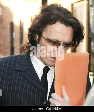 Elvis Presley impersonator Michael Cawthray,43, of Ebberston Road East, Rhos-on-Sea, north Wales, at Solihull Magistrates Court, West Midlands, where magistrates ruled he should stand trial at Crown Court for the alleged assault on Jeffrey Burton, the son of the King's guitarist at a tribute act convention. Stock Photo
