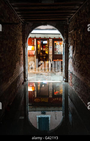 Venice, Italy. 15th June, 2016. An underpassage is full of water on June 15, 2016 in Venice, Italy. The high water in this period is exceptional, and it is a surprise for citizen and tourists.  Credit:  Simone Padovani /Awakening/Alamy Live News Stock Photo