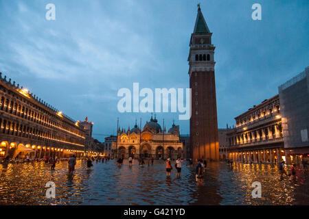 Venice, Italy. 15th June, 2016. Tourists enjoy St. Mark square during the high water on June 15, 2016 in Venice, Italy. The high water in this period is exceptional, and it is a surprise for citizen and tourists.  Credit:  Simone Padovani /Awakening/Alamy Live News Stock Photo