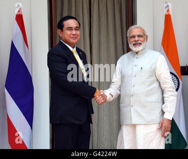New Delhi, India. 17th June, 2016. Indian Prime Minister Narendra Modi welcomes Thai Prime Minister General Prayut Chan-o-cha following arrival ceremonies June 17, 2016 in New Delhi, India. Credit:  Planetpix/Alamy Live News Stock Photo