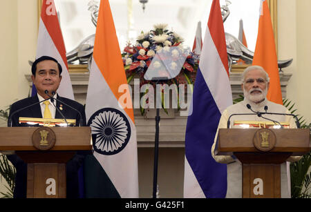 New Delhi, India. 17th June, 2016. Indian Prime Minister Narendra Modi (R) attends a joint press conference with his Thai counterpart Prayut Chan-o-Cha at Hyderabad House in New Delhi, capital of India, on June 17, 2016. India and Thailand Friday agreed to build partnership in defense, maritime security and combating terrorism, said officials. Credit:  Stringer/Xinhua/Alamy Live News Stock Photo