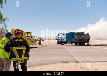 Las Vegas, Nevada, USA. 17th June, 2016. North Las Vegas Fire Department battle a garbage truck on fire at the Nevada Army National Guard - Clark County Armory -  6400 Range Rd, Las Vegas, NV 89115  - 1:50PM Credit:  Ken Howard/Alamy Live News Stock Photo