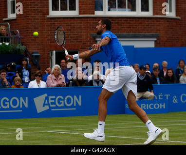 Queens Club, London, UK. 18th June, 2016. Aegon Queens Tennis Championships Day Six. Marin Cilic (CRO) volleys in his semi final match against reigning champion Andy Murray (GBR). Credit:  Action Plus Sports/Alamy Live News Stock Photo