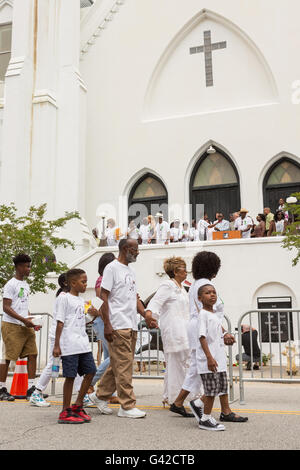 Charleston, United States. 18th June, 2016. Family members of the Charleston Nine gather at the front of the Mother Emanuel African Methodist Episcopal Church for a memorial service on the anniversary of the mass shooting June 18, 2016 in Charleston, South Carolina. Nine members of the church community were gunned down during bible study inside the church on June 17, 2015. Credit:  Planetpix/Alamy Live News Stock Photo