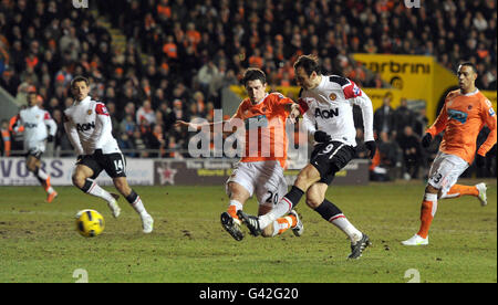 Soccer - Barclays Premier League - Blackpool v Manchester United - Bloomfield Road. Manchester United's Dimitar Berbatov scores their third goal during the Barclays Premier League match at Bloomfield Road, Blackpool. Stock Photo