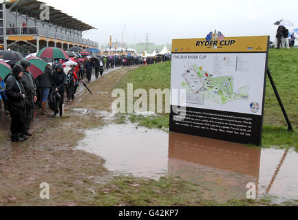 Golf - 38th Ryder Cup - Europe v USA - Day One - Celtic Manor Resort. Spectators pass by a Ryder Cup site sign. Stock Photo