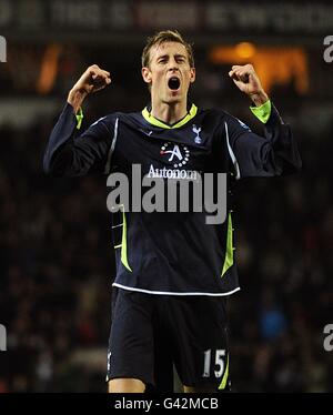 Tottenham Hotspur's Peter Crouch celebrates victory after the final whistle Stock Photo