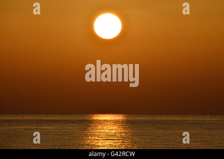 Sunset above horizon at the Agean sea Lesvos Stock Photo