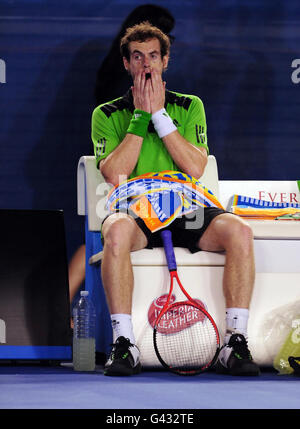 Great Britain's Andy Murray shows his dejection against Serbia's Novak Djokovic in the Men's Final during day fourteen of the 2011 Australian Open at Melbourne Park in Melbourne, Australia. Stock Photo