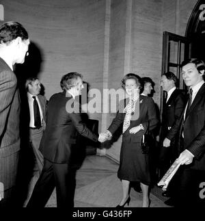 The Prime Minister, Margaret Thatcher visiting the Fleet Street offices of The Press Association, Britain's national news agency. She is seen being greeted by PA Chairman Christopher Dicks Stock Photo