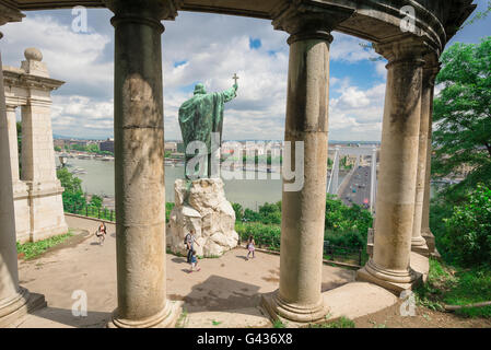 Budapest Gellert Hegy Hill, the statue of Saint Gellert on Gellert-hegy (hill) admonishing the traffic on the Erzsebet Bridge in Budapest, Hungary. Stock Photo