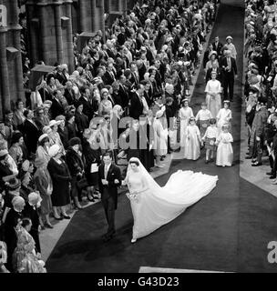Princess Alexandra and her husband Angus Ogilvy, walking towards the West Door at the end of the royal wedding ceremony in Westminster Abbey Stock Photo