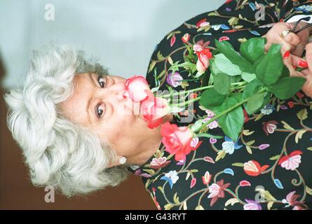 Betty Boothroyd, the Speaker of the House of Commons, with 'Madam Speaker' this morning (Thursday), a hybrid rose specially created and named after her. Miss Boothroyd is only the second MP after Margaret Thatcher to have a rose named in her honour. Stock Photo