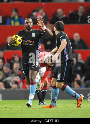Soccer - Barclays Premier League - Manchester United v Aston Villa - Old Trafford. Aston Villa's Darren Bent (left) celebrates with team-mate Stewart Downing (right) after scoring their only goal Stock Photo