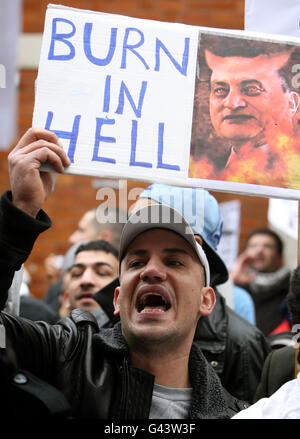 Protestors take part in a demonstration against President of Egypt Hosni Mubarak outside the Egyptian embassy, in central London. Stock Photo