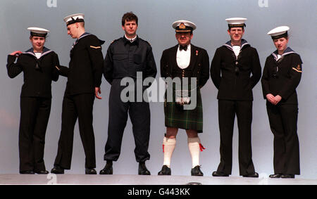 Navy personnel display their new uniforms aboard H.M.S. Illustrious, at Portsmouth. Stock Photo