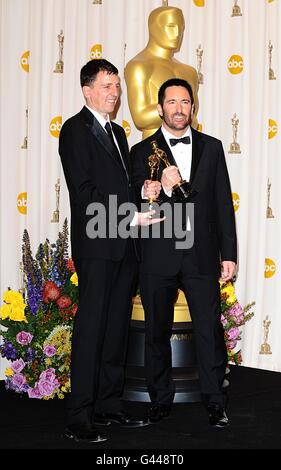 ** Trent Reznor and Atticus Ross with the Best Original Score award, received for The Social Network, at the 83rd Academy Awards at the Kodak Theatre, Los Angeles. Stock Photo