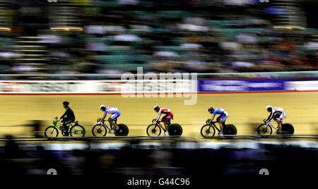 Competitors in the Men Keirin during the Track World Cup at the National Cycling Centre, Manchester. Stock Photo