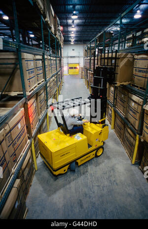 Forklift working in a large distribution warehouse
