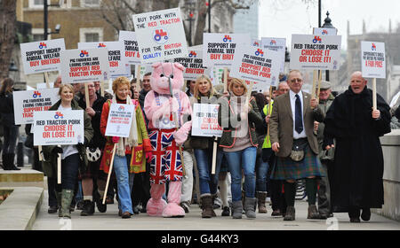 (second left to right, front row) Christine Hamilton, Sharron Davies and Liz McClarnon join the National Pig Association rally opposite Downing Street, as hundreds of pig farmers from around the country campaign for a fair deal from supermarkets and processors. Stock Photo