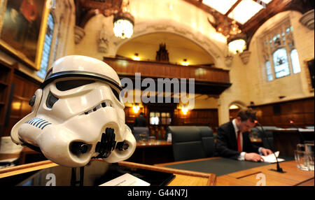 A model of the Stormtrooper helmet is displayed on a plinth in the court room, by the Justices' bench at the UK Supreme Court, Parliament Square, London. The latest episode in a long-running, multimillion-pound copyright battle over the Star Wars Stormtroopers will be played out before justices in the Supreme Court today. The appeal relates to reproductions of the helmet design. Stock Photo