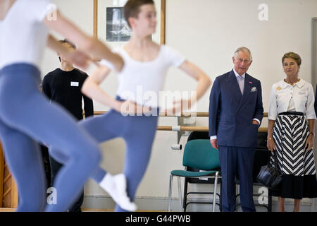 The Prince of Wales and the Duchess of Wellington watch a ballet class during a visit to The Royal Ballet School, White Lodge campus in Richmond Park, south west London. Stock Photo