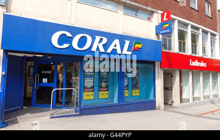 Coral and Ladbrokes betting shops next door to each other Stock Photo