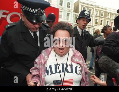 American tourist Maureen Wilding, 46, from Billings, Montana, among the crowd following her hug with the Princess of Wales outside the London Lighthouse, a residential and support centre for people affected by HIV and Aids. The Princess dazzled fans with a determined smile in her first public appearance hours after a video emerged allegedly showing her cavorting with cavalry officer James Hewitt. See PA story ROYAL Diana. Photo by Rebecca Naden/PA. Stock Photo