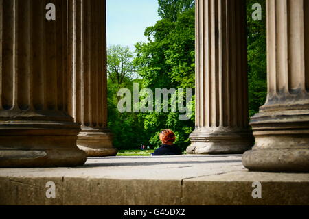 In Spring People enjoy freetime in Nymphenburg Park Munich Germany Europe Stock Photo