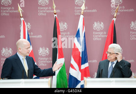 Palestinian President Mahmud Abbas attends a joint-press conference with Foreign Secretary William Hague at the Foreign and Commonwealth Office in central London. Stock Photo