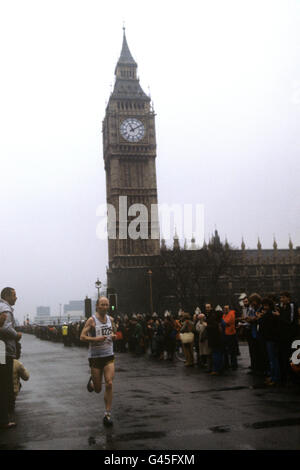 Runners make their way past the Houses of Parliament during the first London Marathon. Stock Photo