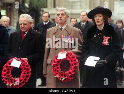 Sara Jones, widow of Lieutenant Colonel H Jones, who died commanding 2 Para and later awarded the VC, joins Desmond Keoghane (cen) and former governor of the Falklands Sir Rex Hunt at a ceremony to remember those who died during the Falklands conflict at the Cenotaph in Whitehall, central London today (Sat). Traffic came to a halt as veterans and bereaved relatives laid wreaths at the monument in a low-key ceremony attended by about 100 people. Mr Keoghane's son Kevin was a Welsh guard who was killed on board the Sir Galahad. See PA story DIPLOMATIC Falklands. Photo by Sean Dempsey/PA. Stock Photo