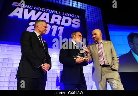 Crewe Alexandra's fist team manger Dario Gradi MBE (centre) is interviewed by Compere Mark Clemmitt (right) as he recieves his Contribution to League football Award at the Football League Awards 2011 Stock Photo