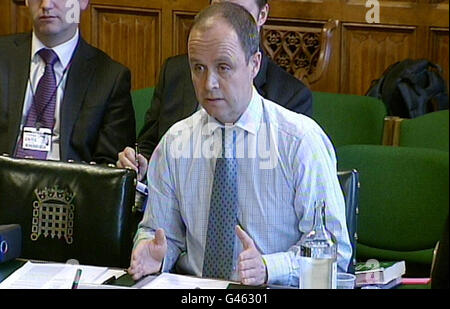 Metropolitan Police's Acting Deputy Commissioner John Yates appearing before the Culture, Media and Sport Select Committee where he answered questions on News of the World phone hacking claims. Stock Photo