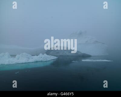 Huge icebergs are on the arctic ocean at Ilulissat ice fiord, Greenland Stock Photo