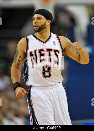 New Jersey Nets' Deron Williams Is Congratulated By Teammate Sasha 