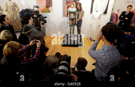 Designer Charlotte Todd with the dress she designed which, was worn by Kate  Middleton at the St Andrew's University charity fashion show. The dress is  being auctioned with an estimate of 8,000-10,000
