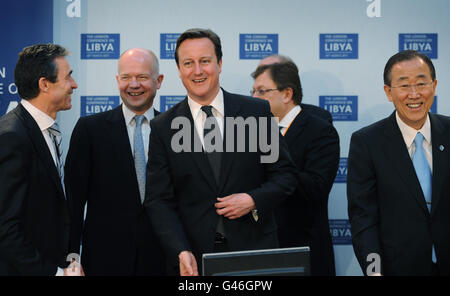 British Prime Minister David Cameron (centre) is pictured with his foreign secretary William Hague (2nd left), NATO Secretary General Anders Fogh Rasmussen (left) and UN Secretary General Ban Ki Moon (right) at the opening meeting of the Libya Conference in London.