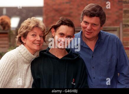 Anti-Roads protestor Swampy (real name Daniel Hooper) relaxes with his parents Peter and Jill at their home in Hazlemere, near High Wycombe in Buckinghamshire today (Sunday). He had been released from custody having been fined 500 after spending seven days hidden deep in amaze of home-dug tunnels in protest at the planned extension of the A30 road in Devon. He commented: 'I am going to have a little holiday and then go on to the next protest site and build a mega tunnel. That could be along the site of the A30 or perhaps at Manchester Airport or in Guildford'. See PA Story ROADS Swampy/By Stock Photo