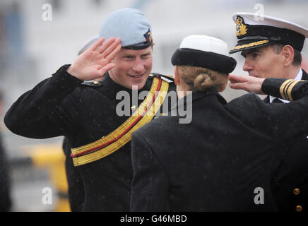 Prince Harry, in his role as Commodore-In-Chief, Small Ships and Diving, presents medals to members of the First and Second Mine Countermeasures Squadrons (MCM1 and MCM2) at Portsmouth Naval Base, Hampshire, to mark their service in Iraq. Stock Photo